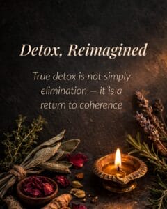 A glowing candle in a brass holder placed beside dried petals and herbs against a dim, moody background. text overlay: "Detox, Reimagined. True detox is not simply elimination - it is a return to coherence."